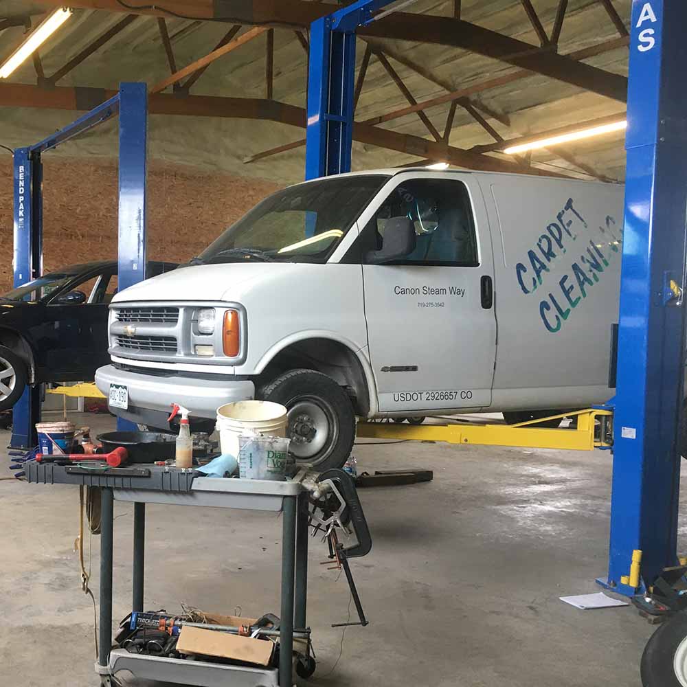 Van on Lift for Fleet Maintenance